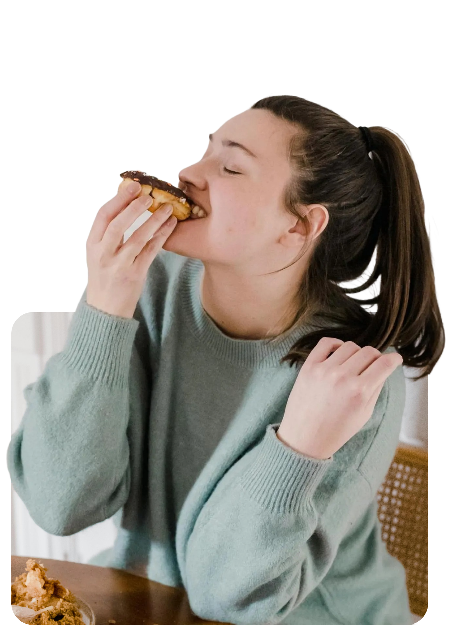 women eat a sandwich